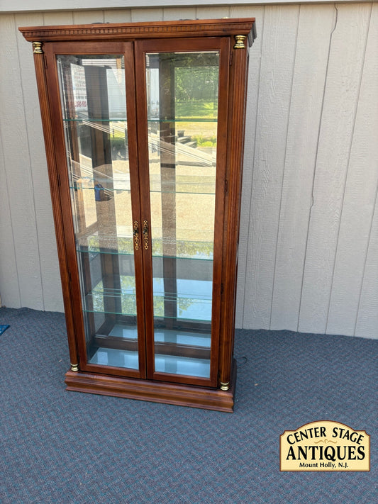 67753 Pulaski Traditional Glass Front Curio Cabinet with Brass Accents