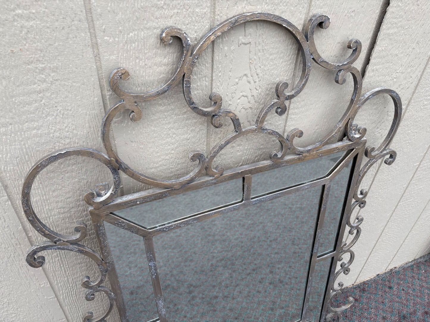 Ornate Wrought Iron Wall Mirror with Scrollwork Design