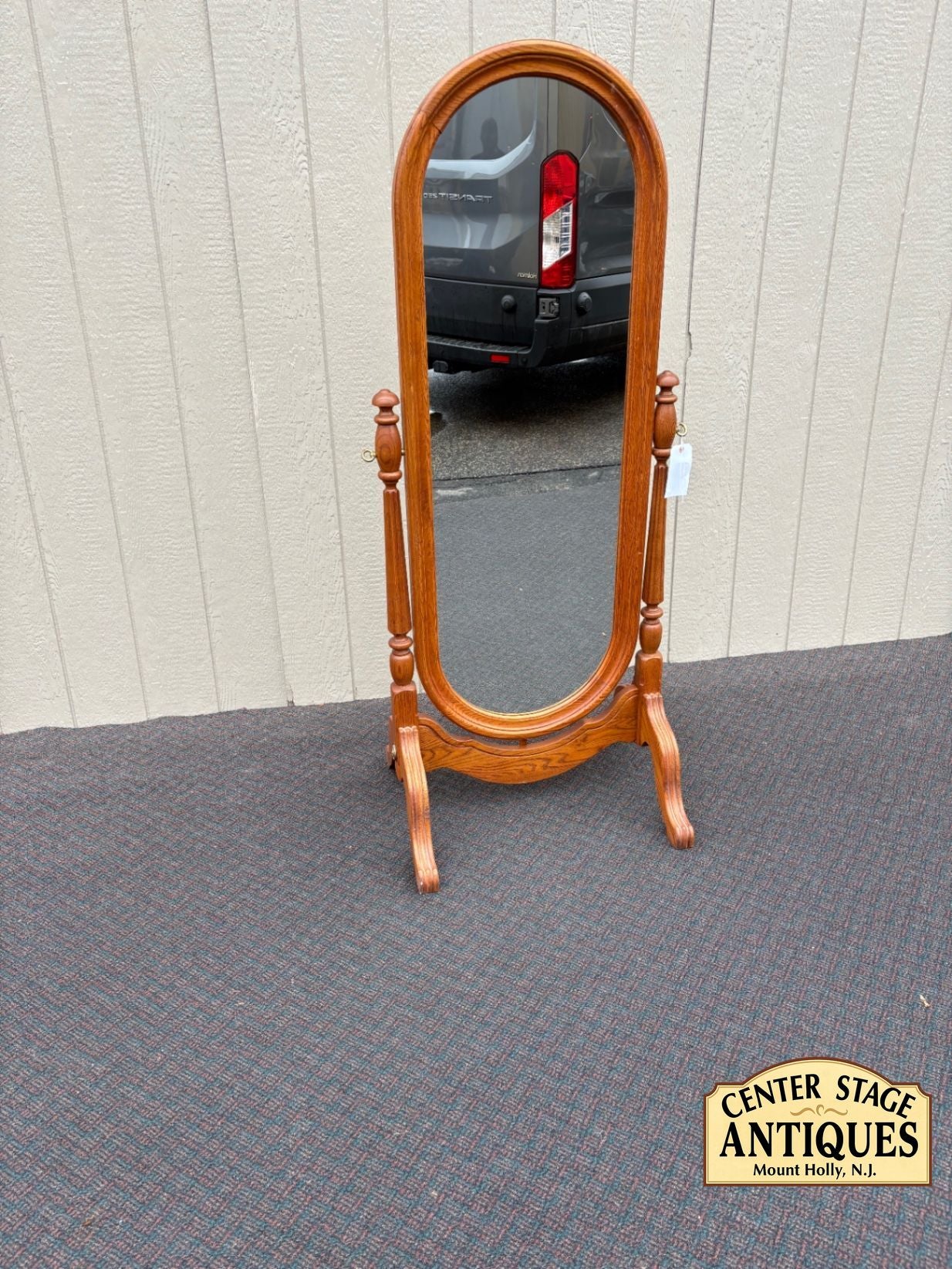 66934  Elegant Oak Cheval Mirror with Turned Supports and Oval Glass