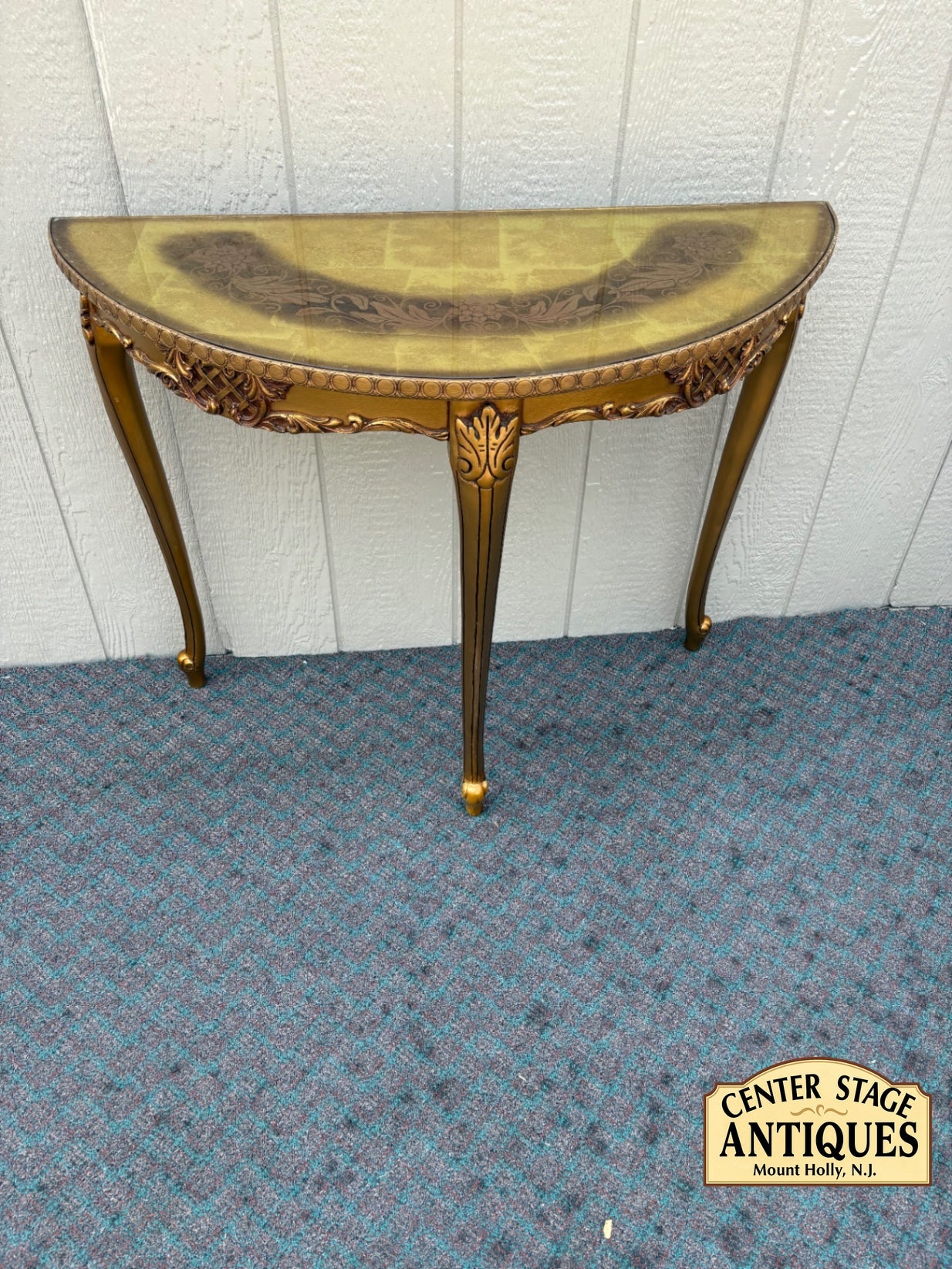 67978 Elegant Gold Demilune Console Table with Intricate Floral Design
