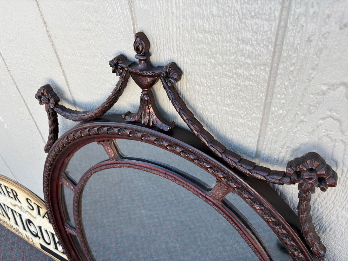 66933  Large Oval Mahogany Wall Mirror with Carved Swag Detailing