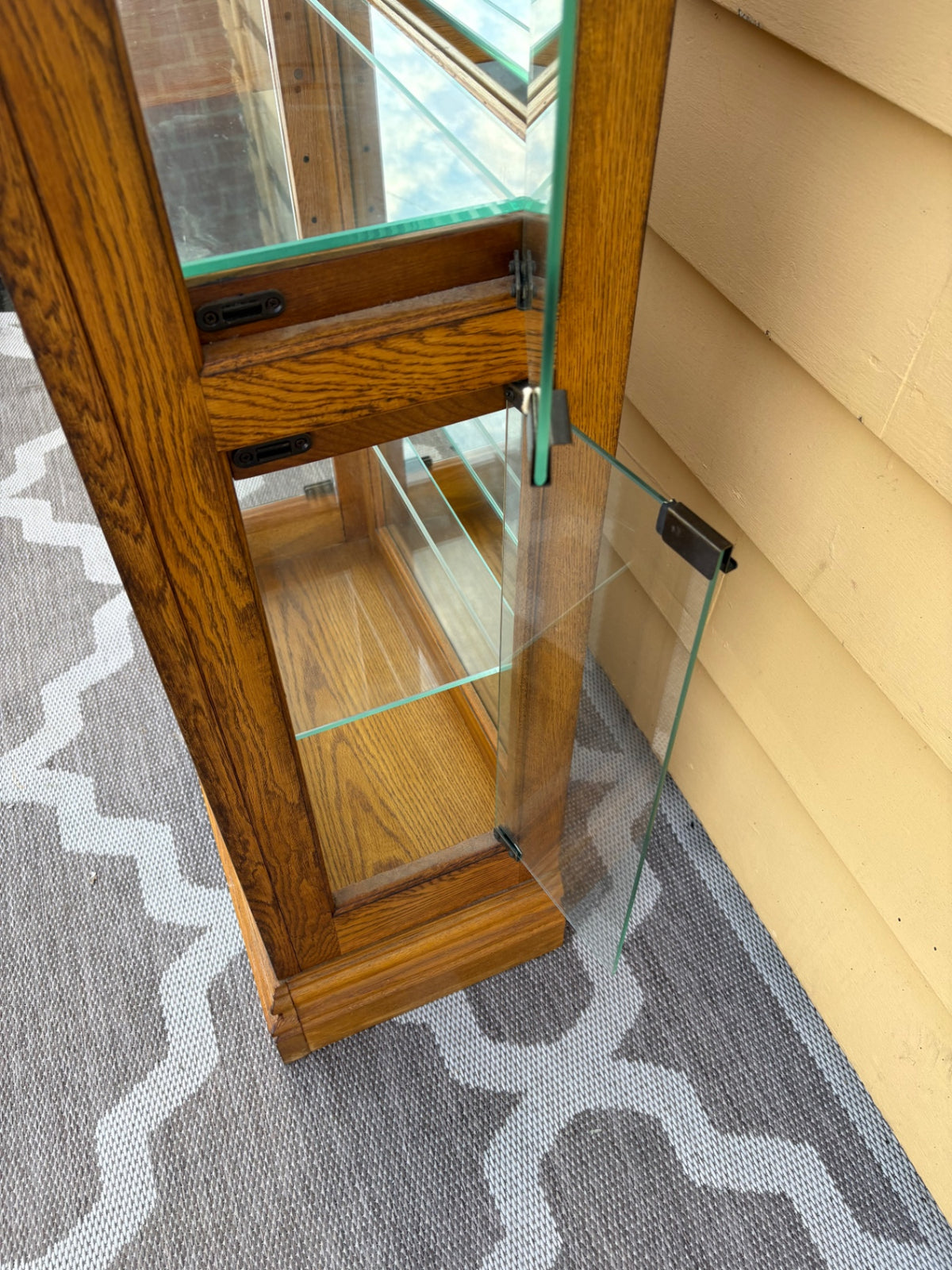 68202  Oak Curio Cabinet with Etched Glass and Crown Molding
