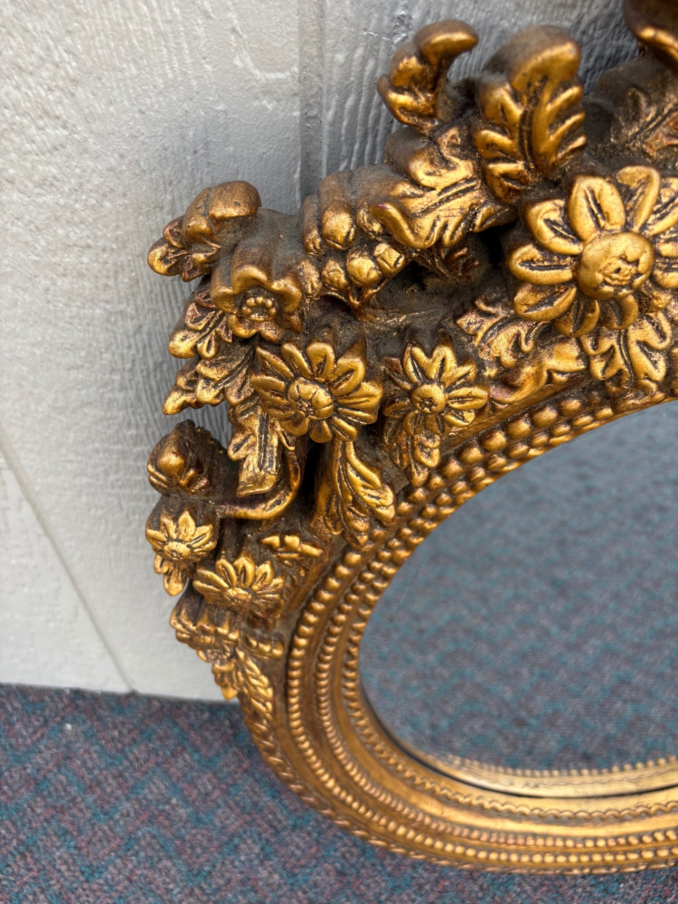 Ornate Gilt Gold Oval Mirror with Floral and Ribbon Details
