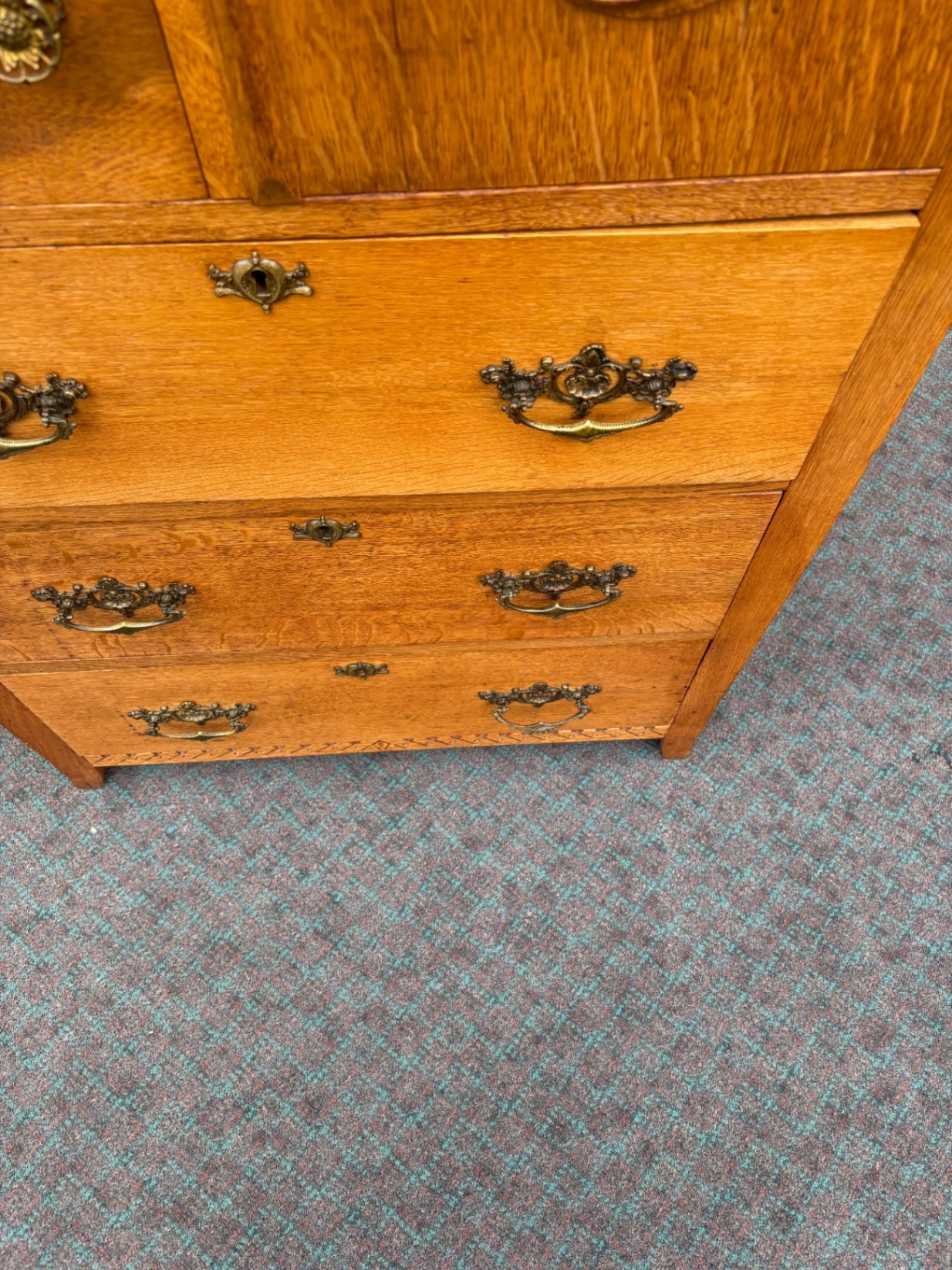68057  Antique Oak Bonnet Chest with Ornate Carvings and Brass Hardware
