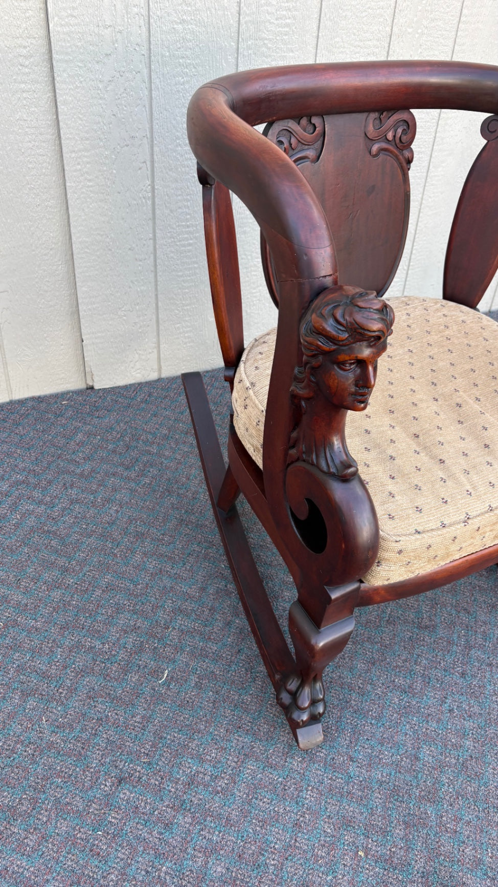 Victorian Mahogany Rocking Chair with Carved Bust Details
