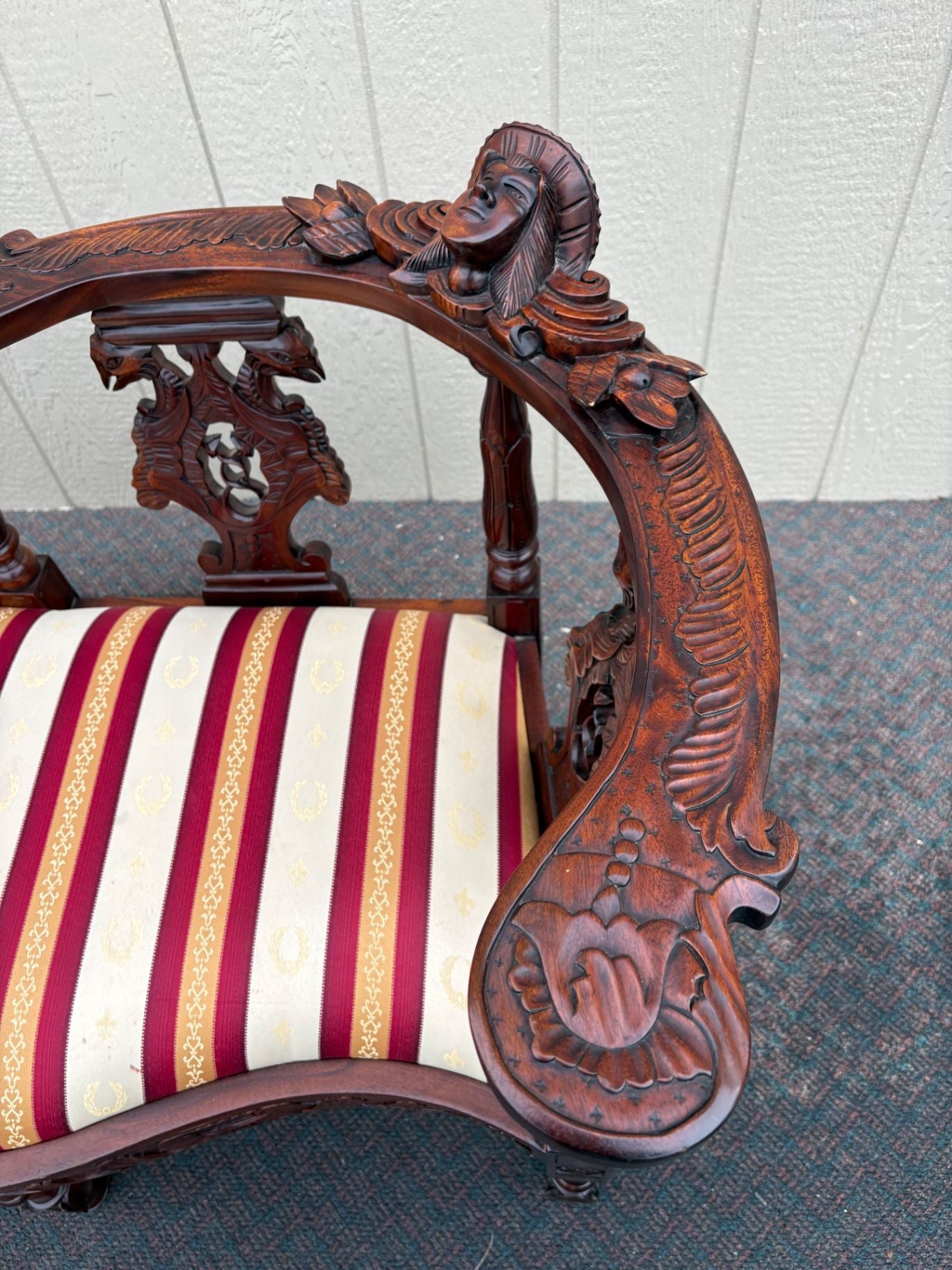 67469  Victorian  Style Carved Mahogany Settee with Figural Details and Upholstery