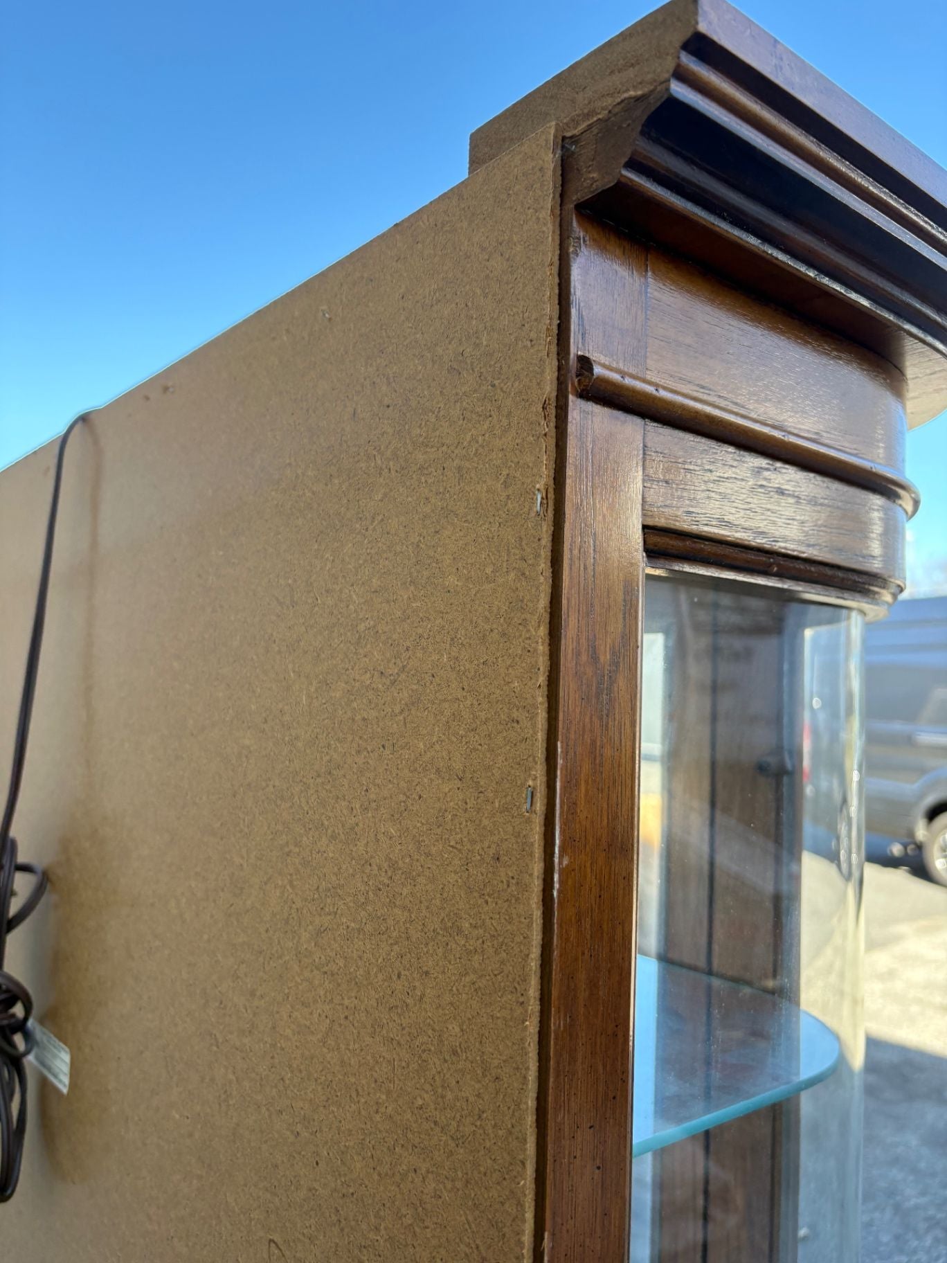 67589  Pulaski Lighted Curio Cabinet with Bowed Glass Doors