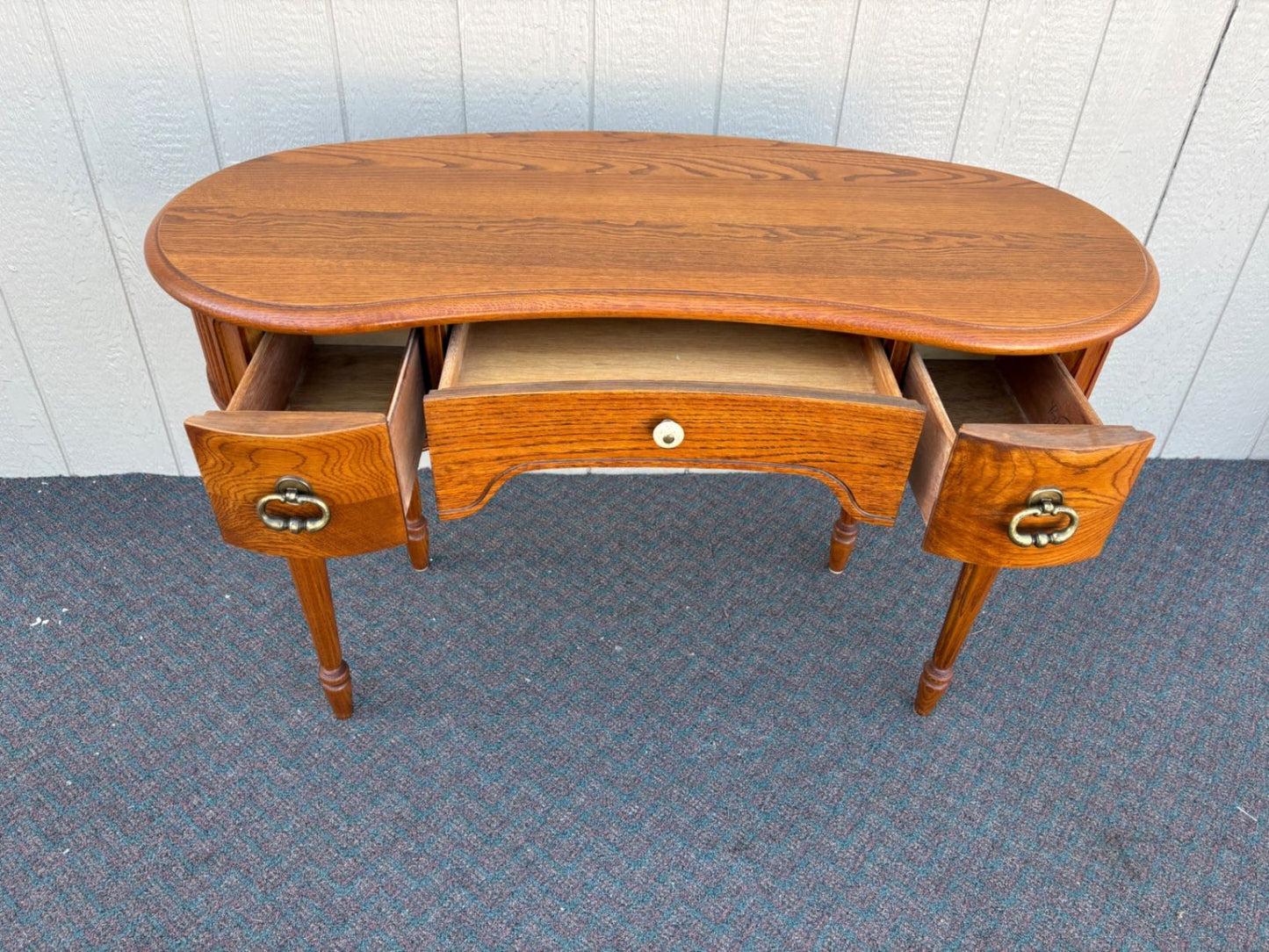 67435 Lexington Oak Kidney Desk with Brass Hardware