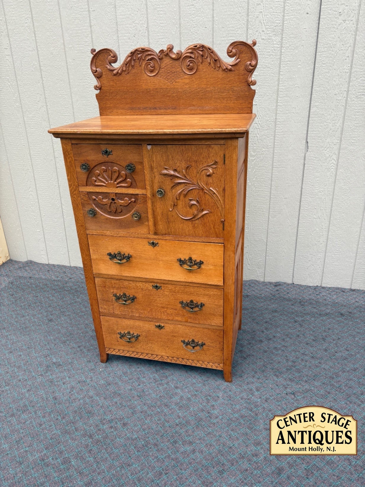 68057  Antique Oak Bonnet Chest with Ornate Carvings and Brass Hardware