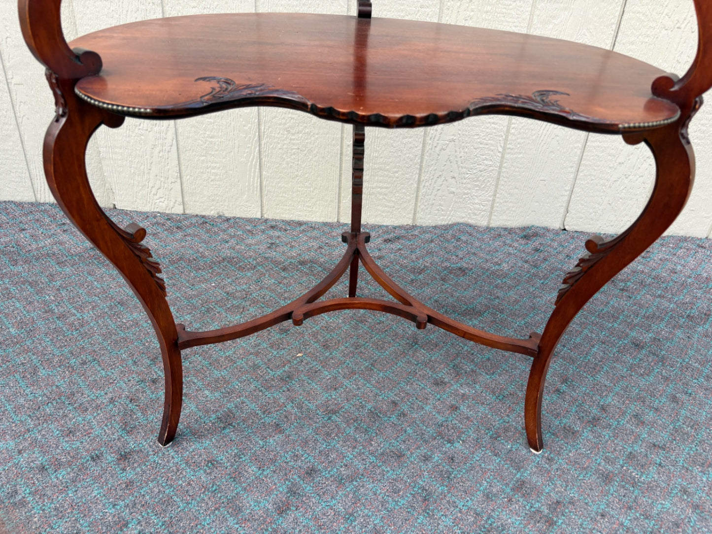 Mahogany Two-Tier Figural Table with Ornate Carvings