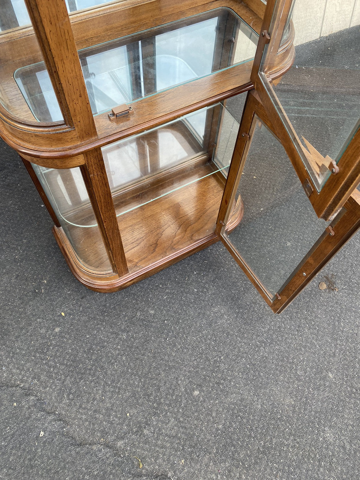 66240   Modern Pulaski Furniture Bow Glass Curio with Beveled Glass Front panels